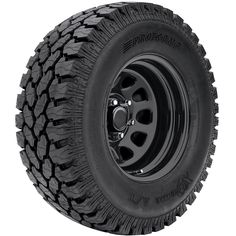 an all terrain tire on a white background