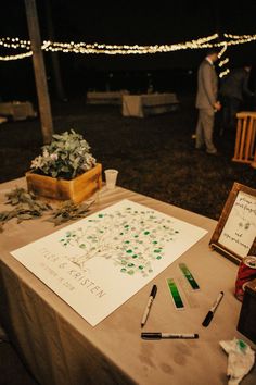 the table is set up for a wedding reception with green confetti on it