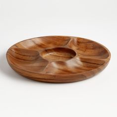 a wooden bowl on a white background