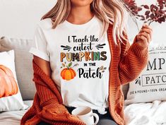 Fall Teacher Shirts, Halloween Teacher Shirt, Pumpkin Teacher Shirt, Cute Teacher Shirts, I Teach The Cutest Pumpkins In The Patch Shirt Tee 📢Please Check All Photos For Details.   📢Choose Your T-Shirt Size From The Drop-Down Lists Next To The item Picture   📢Choose Of Your T-Shirt Color From The 2nd Picture 🧨Please contact the store for long-sleeved shirt and sweatshirt color options. 🧨Please check which product you are paying for in the size options section, because there are different options such as short-sleeved shirts, V-Neck, sweatshirts and long-sleeved shirts. 📢Use "Add message to Seller" link On The Checkout Page To Send me the Following important Details For Your Order's Customization.   📢Shipping Time Varies by location (we are located in Sugar Land, Texas) please consid Fall Teacher Shirts, Cute Teacher Shirts, Patch Shirt, Patches Shirt, Sugar Land, Cute Pumpkin, Teacher Shirts, Shirt Color, The Cutest