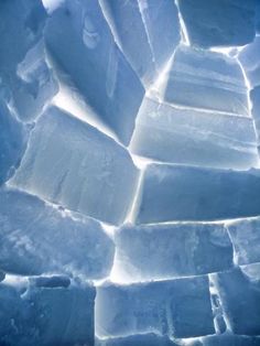 ice blocks are stacked together in the snow