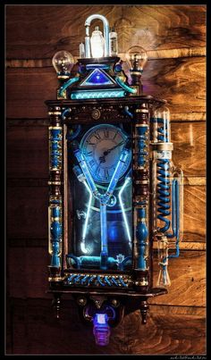 a clock that is on the side of a wooden wall with blue light coming from it