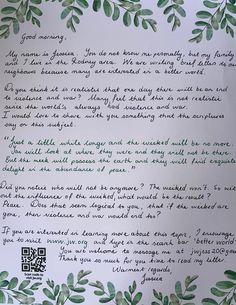 a handwritten letter with green leaves on it