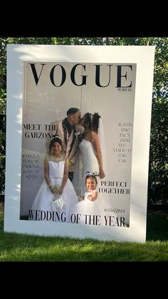 a wedding photo frame with the bride and groom kissing in front of a magazine cover