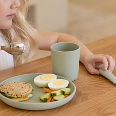 Take a bite out of boring dinnerware and encourage kiddos to eat independently with the Big Bites Starter Toddler Dinnerware Set from Lalo. It includes a matching plate, bowl, cup and utensils, all made of food-grade silicone and stainless steel. Big on style but sized just right, it's perfect for transitioning toddlers to the grown-up table.   • Suitable for ages 12 months+  • Includes a plate, 8 oz. bowl, 6 oz. cup, fork and spoon  • Plate, bowl and cup: BPA-free, food-grade silicone with a ri Blueberry Oatmeal, Forks And Spoons, Chopsticks, Dinnerware Set, Food Grade Silicone, Meal Time, Crate And Barrel, Sage Green, Food Grade