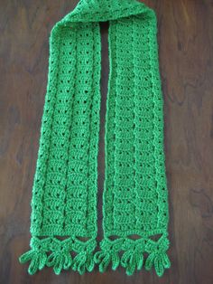 "Be prepared to have fun in this loopy fringed scarf.  Perfect for St. Patrick's Day or to warm your neck on any cool day. It is made with Red Heart Soft acrylic yarn.  Measures 57\" x 8\" Machine wash and dry, gentle. Made in smoke-free, pet-free environment." Shark Blankets, Crochet Toddler, Green Scarf, Pink Scarves, Toddler Blanket, Crochet Winter, Crochet Lovers, Crochet Scarves, Toddler Gifts