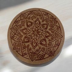 a brown and white circular object sitting on top of a table