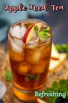 an apple iced tea in a glass with ice and garnish