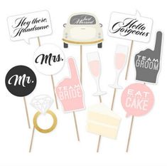 wedding cake toppers with bride and grooms on them in black, pink, white and