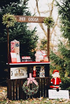 an outdoor hot cocoa stand with christmas decorations