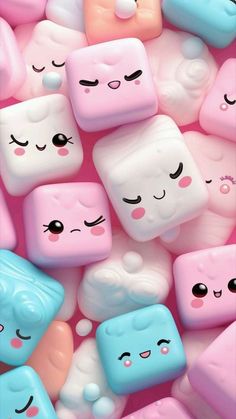 many different colored marshmallows with eyes and noses on top of each other