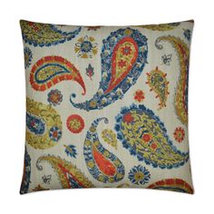 a decorative pillow with an orange, blue and yellow paisley pattern