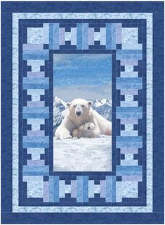 a polar bear and her cub are shown in this quilted photo with blue squares