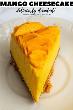 a slice of mango cheesecake on a white plate