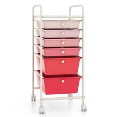 a pink and white cart with five drawers