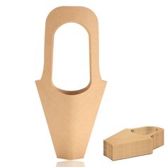 a paper bag with a hole in the middle and a cardboard box next to it