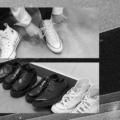 black and white photo of four pairs of shoes