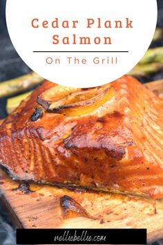 grilled cedar plank salmon on the grill with text overlay