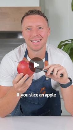 a man holding an apple in front of him with the caption if you slice an apple