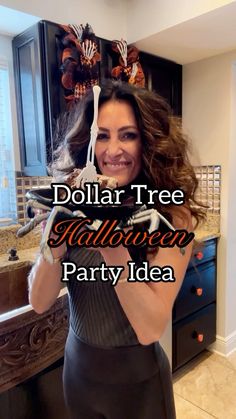 a woman in tights is holding up her halloween party idea with the words dollar tree halloween party idea