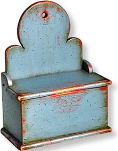 an old blue box with a metal handle on the top and bottom, sitting in front of a white background