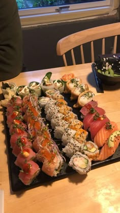 there are many sushi on the table