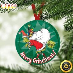 a christmas ornament hanging from a tree with the words merry grinmas on it