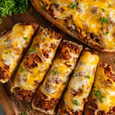 several pieces of bread covered in cheese and meat