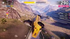 a yellow car is flying through the air with mountains in the background