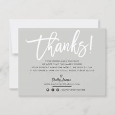 a thank card with the words thanks written in cursive writing on it,