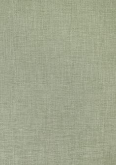 an image of a plain green fabric textured with some sort of clothing material