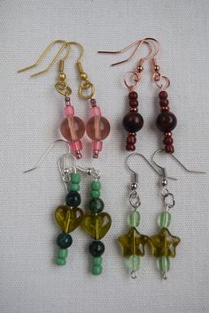 I make all of my beaded earrings by hand. They are fun and unique and will have everyone asking where you found them. They make a wonderful gift for a Birthday, holiday or just to make someone feel special. Please check out my SHOP for additional listings of beaded jewelry, magnets, brooches, blankets AND MORE (https://www.etsy.com/shop/CreationsByBronte) Handmade Cheap Beaded Drop Earrings, Cheap Small Handmade Earrings, Vintage Bead Earrings, Handmade Beaded Jewelry Earrings, Handmade Round Bead Earrings For Gift, Handmade Dangle Jewelry For Birthday, Handmade Beaded Earrings With Round Beads As Gift, Round Beaded Earrings With Ear Wire For Gifts, Handmade Dangle Earrings For Birthday