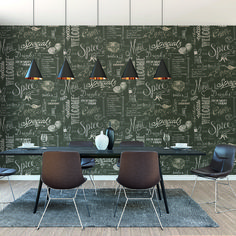 a dining room with chalkboard wallpaper and chairs in front of a black table