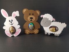 three different types of chocolates in the shape of sheep, bear and bunny ears