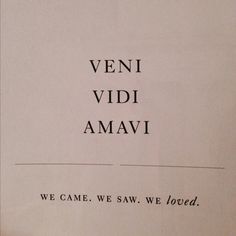 an open book with words written on the pages and in black ink that reads, veni vidi amavi we came we saw we loved