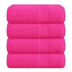 three bright pink towels stacked on top of each other in front of a white background