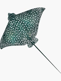 an animal print umbrella is flying through the air with its handle extended and it's cover partially open