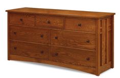 a large wooden dresser with six drawers