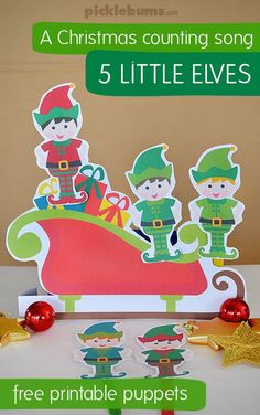 a christmas counting song for five little elves with free printable puppets on the table