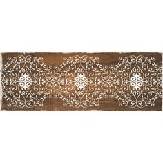 a brown and white rug with an intricate design