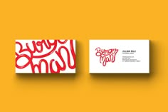 two business cards with red and white designs on them, one has the word happy mom