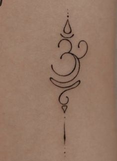 a tattoo on the back of a woman's arm