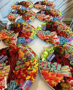 a table topped with lots of different types of candies