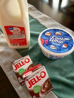 yogurt, milk and other items on a table