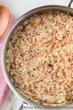 a pot filled with rice on top of a counter