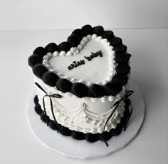 aries baby black and white heart laced cake with black ribbon by marias_sweettreats ♡ cake decorating designs birthday cakes aesthetic winter cake graduation cake cake royal vintage heart cake buttercream cake coquette cake custom cake design retro cakes Black And White Heart Shaped Cake, Aesthetic Cake Designs Black, Black And White 18th Birthday Cake, Vintage Cake Black And White, Goth Heart Cake, Vintage Graduation Cake, Black And White Cakes Birthday, Cake Ideas Black And White, Sweet 16 Black And White Theme