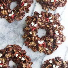 chocolate christmas wreath cookies on a marble surface