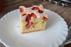 a piece of cake sitting on top of a white plate