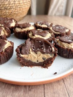 chocolate cupcakes with peanut butter frosting on a plate