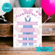 a pink and blue birthday party with balloons